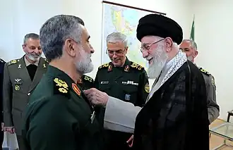 Hajizadeh receiving the Order of Fath from the Supreme Leader of Iran, after October missile strikes on Israel