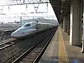 A N700-7000 series Shinkansen at Hakataminami Station