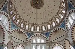 The small Rüstem Pasha Mosque (1561) is an early example of Sinan's use of an octagonal support system.[102]