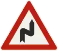 111-20 – Double curve, to the right (formerly used )