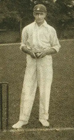 Black and white photo of a male cricketer