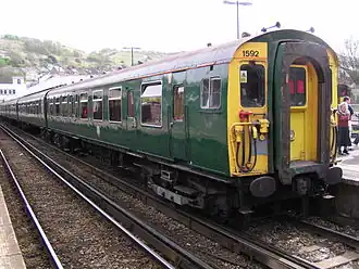 Class 411 4 CEP no. 1592, at Dover Priory on 27 April 2003, whilst forming a special excursion train around Kent and East Sussex. This unit was specially repainted into its original Southern Green livery, to commemorate the retirement of the 4CEP fleet from service. This unit has been withdrawn from service in 2004 and has since been scrapped.