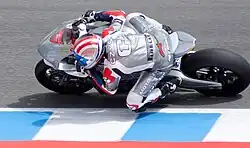Michael Czysz riding the MotoCzysz E1pc electric racing motorcycle
