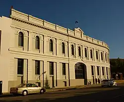 This is a photograph of the Customs House built in 1888 that was used as a US Navy storage site during World War II.