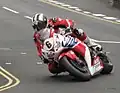2013 Isle of Man TT&nbsp;Superbike Race Lap 6&nbsp;– Michael Dunlop (6) 1000cc Honda Parliament Square, Ramsey 2 June 2013.