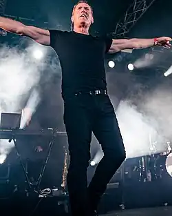 McCluskey performing live with Orchestral Manoeuvres in the Dark (OMD) in Cologne, Germany, 2018