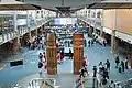"Musqueam welcome figures" by Susan A. Point in the International Arrivals hall of Vancouver International Airport