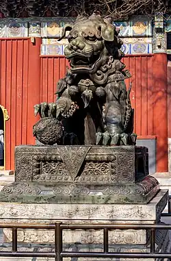 A Chinese guardian lion outside the temple