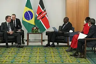 President Jair Bolsonaro with incoming Kenyan Ambassador to Brazil, Lemarron Kaanto; April 2021.