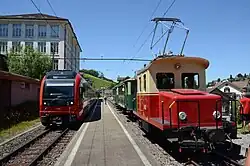 ABe 4/12 (Stadler Walzer), operating as S23 service, and a nostaglic train of AB at Wilen