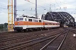 Deutsche Bundesbahn 111 158 with orange and white Rhine-Ruhr S-Bahn livery at Köln Hbf in 1985