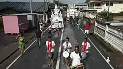 2 Tadjah being moved on a road