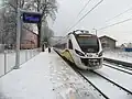 A Koleje Dolnośląskie train at the station in Janowice Wielkie