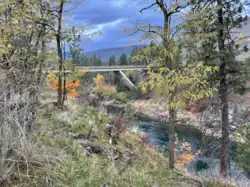 Charles Road crossing the Spokane River and connecting the west and east sides of the community.