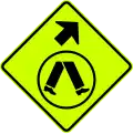 (W6-V2-1) Pedestrian Crossing Ahead on Side Road (veer right) (used in Victoria)
