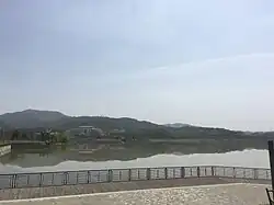 A man-made lake in front of Zilongwan Hot Spring Resort in Huitang Town.