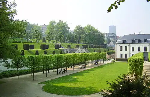 Clipped trees in a formal bosquet form the Promenade des abbesses