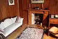Acacia Cottage, interior, main room with fireplace.
