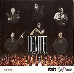 The cover features Lulgjuraj and Sejko and four other persons within a black-coloured picture