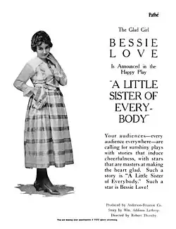 Black and white magazine advertisement featuring Bessie Love in period dress