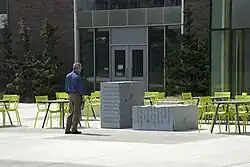 several versions of an IKEA white chair, starting out fully assembled and then eventually becoming completely dissembled