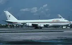 Image of Air Dabia 747, C5-FBS, at Miami Airport in 1999.