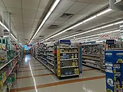 Two aisles of a Rite Aid drugstore