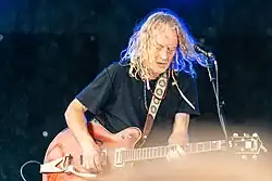 Sparhawk plays in Derecho Rhythm Section in the rain in Bemdiji on June 22, 2024.