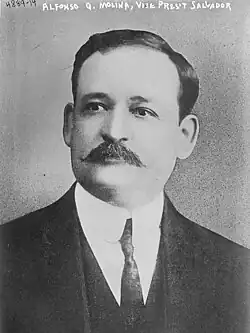 A black-and-white portrait photograph of Alfonso Quiñónez Molina