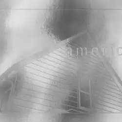 A sliver shine on a house with the words 'American Football' in its foreground