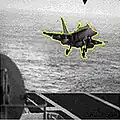 Photo of fighter jet landing on an aircraft carrier