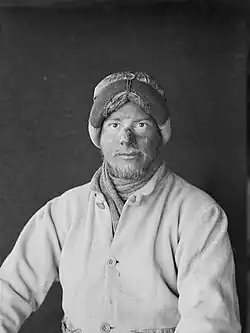 Monochrome portrait photograph of Apsley Cherry-Garrard in arctic explorer's woollen clothing with sunburnt nose and goggle-marks