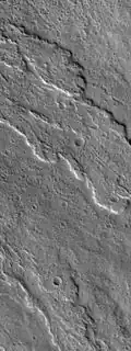 Mars Global Surveyor Mars Orbital Camera (MOC) image of lobate lava flows on flank of Ascraeus Mons.