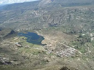 The lake named Quchapampa and the village of Aucara in the Lucanas Province