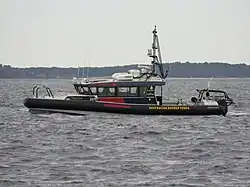 Australian Border Force rigid-hulled inflatable boat Rottnest Island near Kwinana Bulk Terminal, August 2021