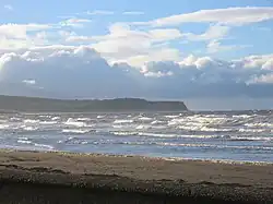 Part of Ayr Beach with the Heads of Ayr in the background