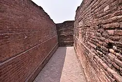 A narrow lane inside Ballal Dhipi complex