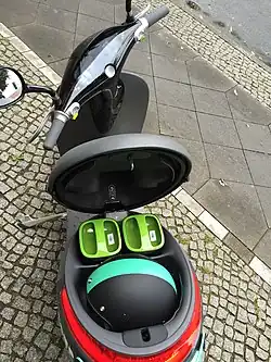 Gogoro 1 Series with seat open, showing traction batteries