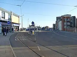 Looking south-east, showing tram stops on the outside and bus stops on the inside