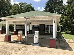 The reconstructed Ben Roy Service Station that stood next to the grocery store where Till encountered Bryant in Money, Mississippi,[245] 2019