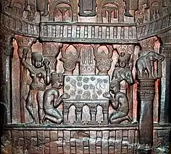 Relief of the Diamond Throne (Vajrasana) with two triratnas