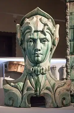 Bust decorating the balconies of 29 avenue Rapp, Paris, by Alexandre Bigot and Jean-Baptiste Larrivé [fr] (1901)