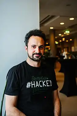 Marczak portrait taken in Defenders' Days 2024 conference in Stockholm