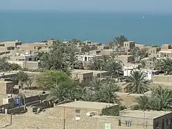 Aerial, sea-facing view of the village of Bonju