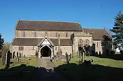 The church with the Morton Chapel to the centre-right