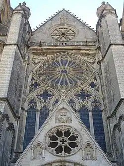 The flamboyant Grand Housteau and west rose window