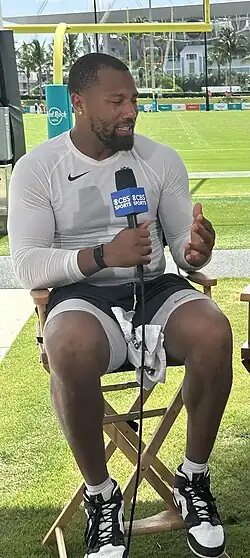 Bradley Chubb being interviewed by CBS Sports at Miami Dolphins training camp in July 2025