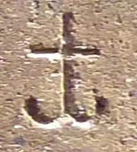 Kya (vertical assembly of consonants "Ka" and "Ya" ), as in "Sa-kya-mu-nī " ( 𑀲𑀓𑁆𑀬𑀫𑀼𑀦𑀻, "Sage of the Shakyas")