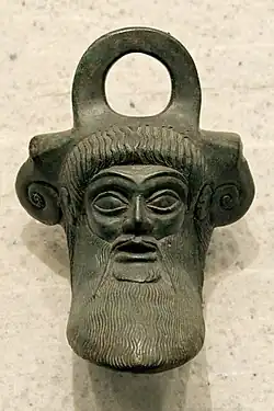 Ancient Greek mascaron from a situla, late 6th century BC, bronze, Louvre