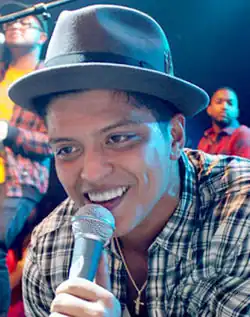 Bruno Mars was born in Hawaii to a father of Puerto Rican and Hungarian and Ukrainian Jewish ancestry and a mother of Filipino and Spanish ancestry.[178]